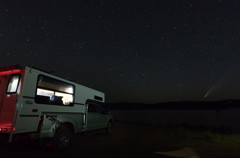 Pop-Up Camper on Ford Truck under night sky